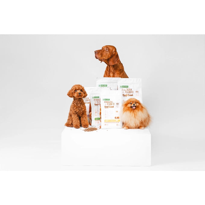Crocchette per cane adulto con mantello rosso gusto salmone